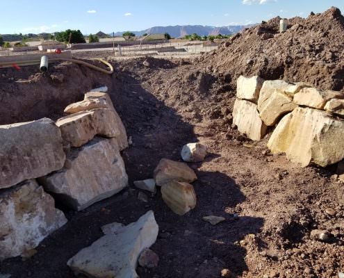 Excavation and rock wall development in Southern Utah