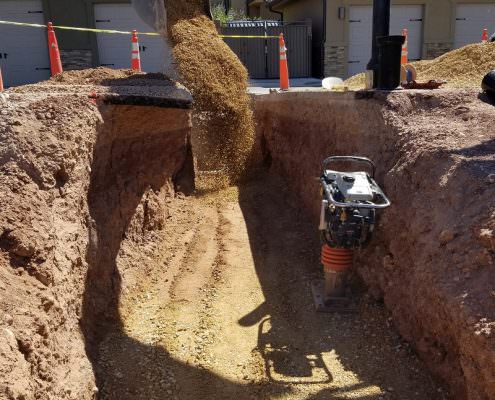 Burying pipe in St. George